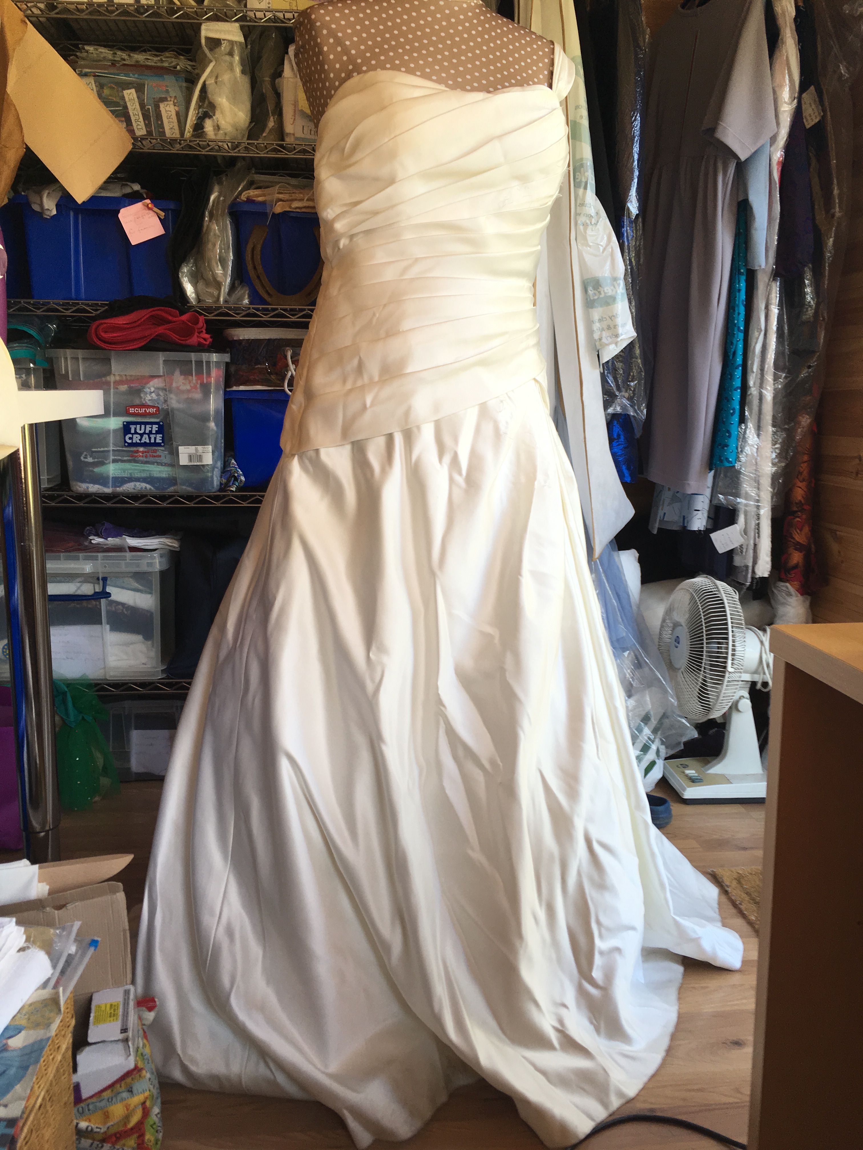 Refashioning a wedding dress into a Christening gown.